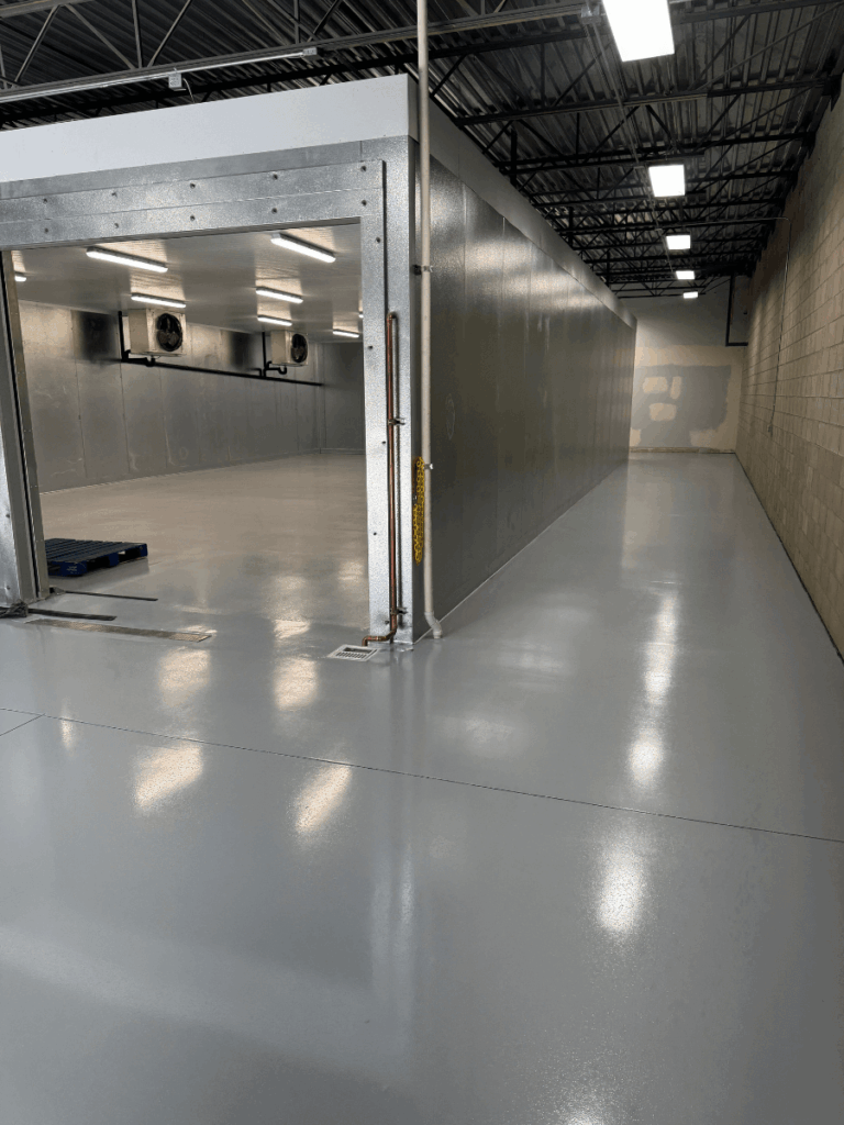 Completed commercial epoxy flooring installation in Bakersfield food processing facility
