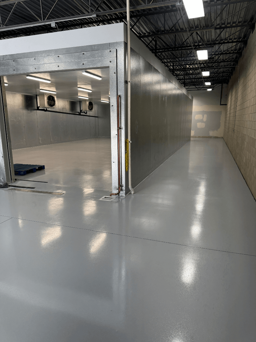 Completed commercial epoxy flooring installation in Bakersfield food processing facility