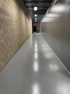 Medium grey epoxy floor with urethane topcoat and aluminum oxide