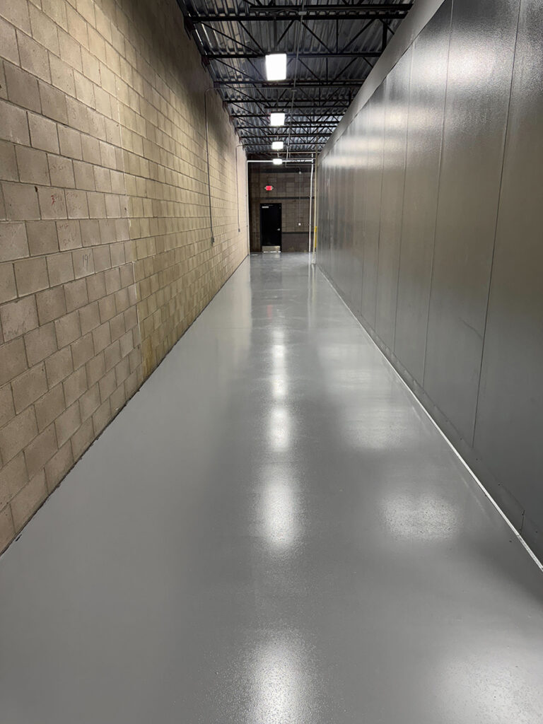 Medium grey epoxy floor with urethane topcoat and aluminum oxide