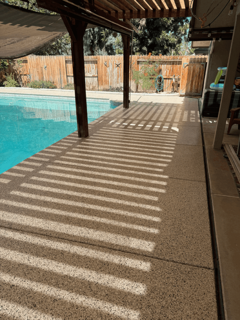 Professional pool deck restoration demonstrating slip-resistant coating benefits