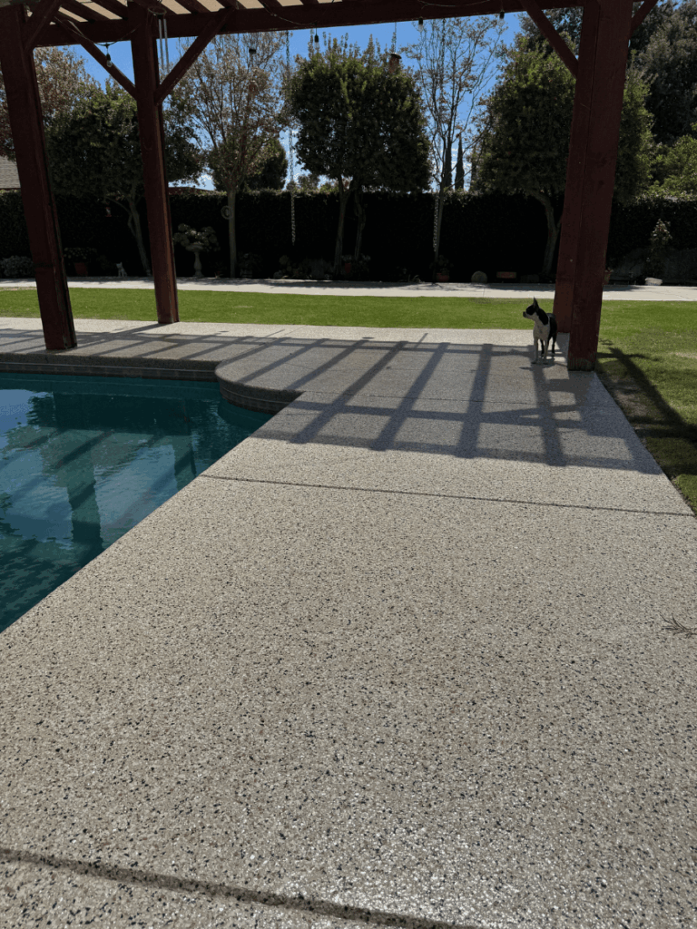 Completed salt water pool deck coating with Shoreline flake system in Bakersfield, CA