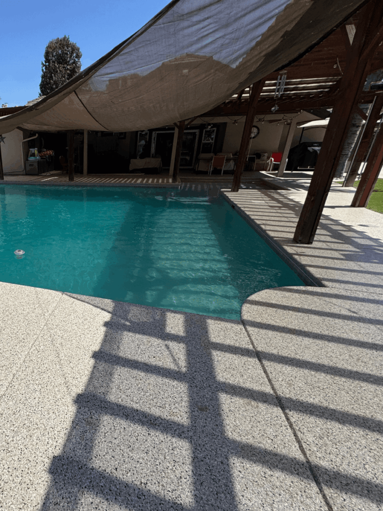 Transformed pool deck showing polyaspartic coating durability and aesthetics