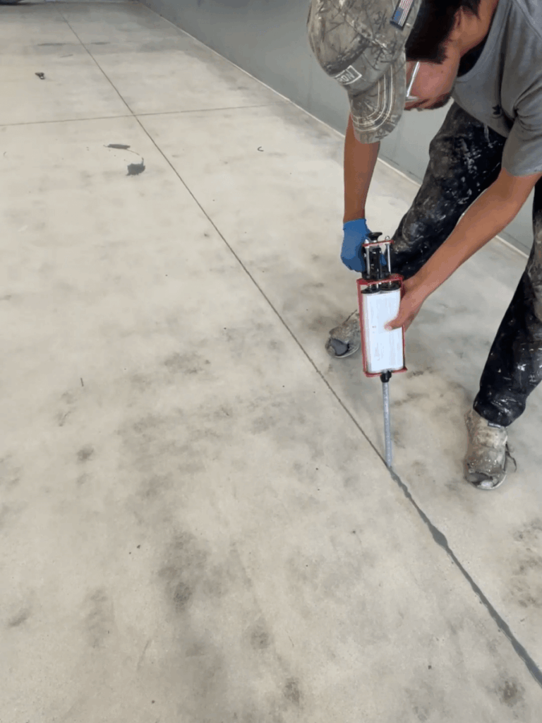 Applying polyurea joint filler to concrete expansion joints before epoxy coating