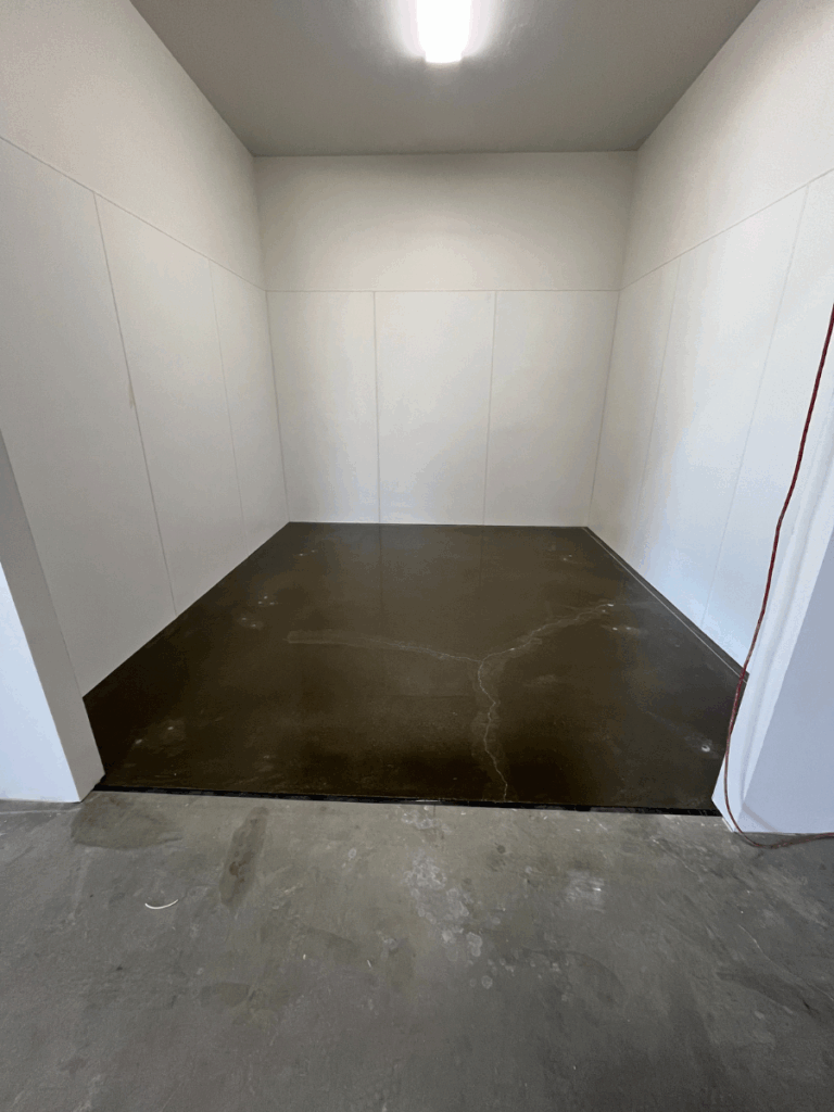 moisture vapor barrier for light blue epoxy flooring