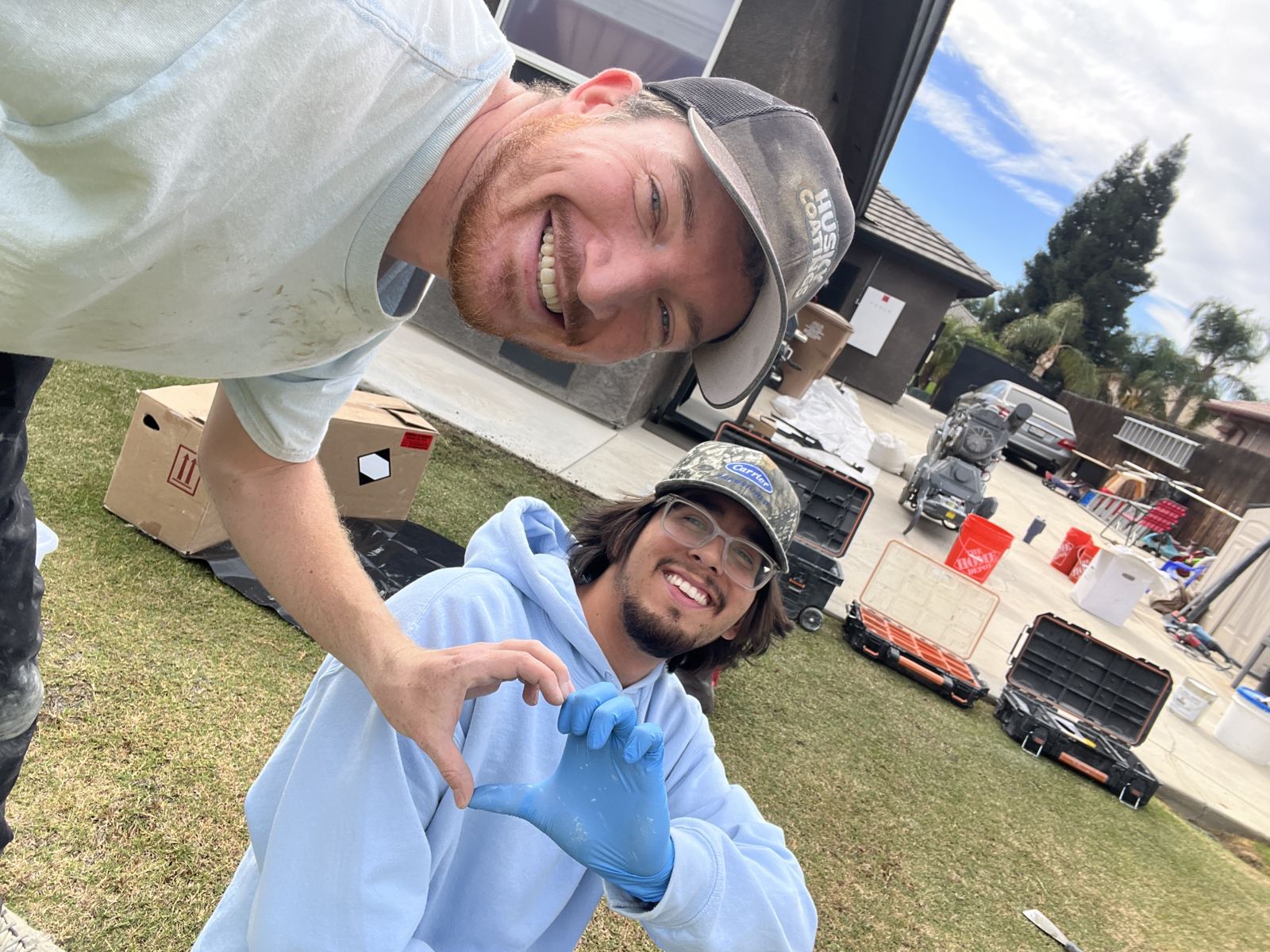 Luke and Aaron, owners of Husky Coatings, on a garage floor coating job in Bakersfield, CA