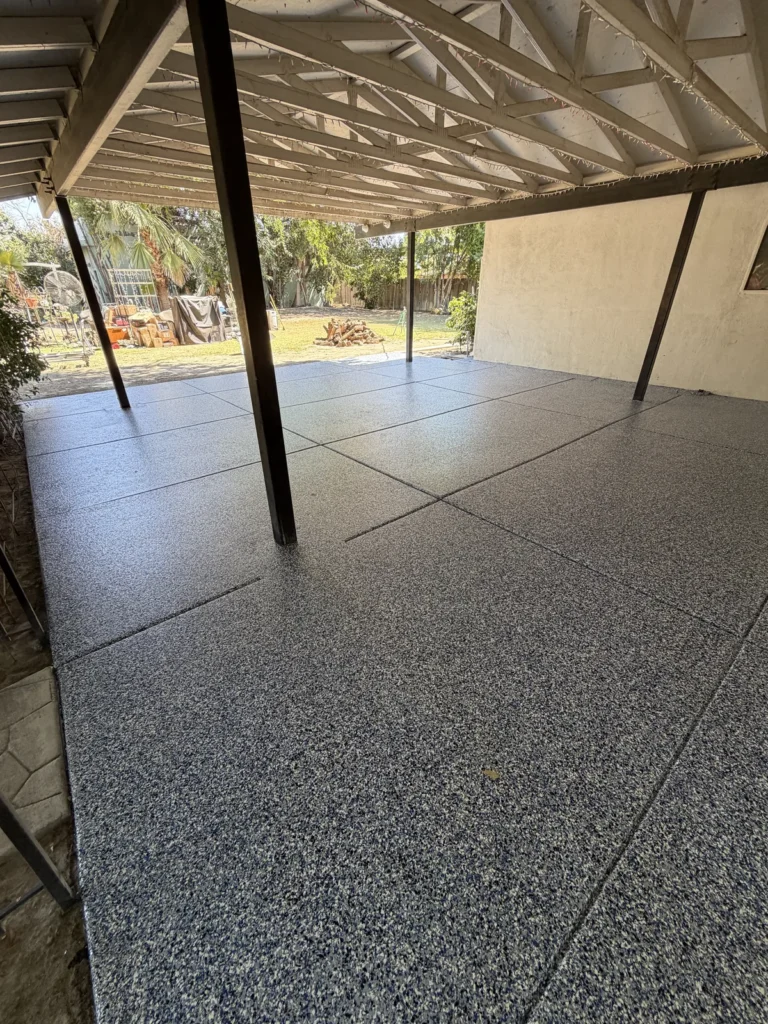 Orbit flake patio floor coating under a covered patio in Bakersfield, CA