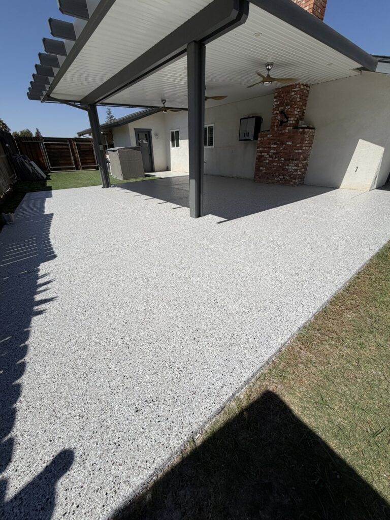 polyaspartic patio floor coating with California Grey flakes Bakersfield CA — after